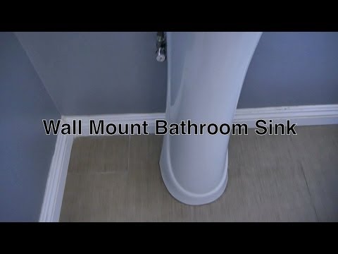 how to hide pipes behind pedestal sink