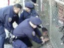 man gets beat by cop
