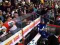 Domi fights with a fan.