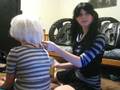 Rinali styling Allen's hair