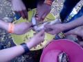 Gutting a fish on camp