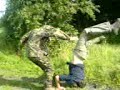 Boy lands very unnaturally on his head! Boy lands very unnaturally on his head!
