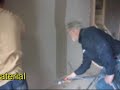 The Skimmer.  Machine for spray applying Skim Coat