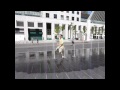 Bunch of friends making bets on who can run across the fountain without getting wet. Recorded at Place Des Arts Montreal.