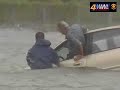 Man rescued from submerged car.