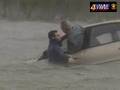 Man rescued from submerged car.