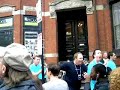 The grand opening of apple store Boylston street .... genuises cheering the crowd .... about 10000 people visited the store for opening