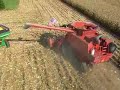 harvesting corn in iowa. this video was taken about 30 feet above the combine. it's an unusual camera angle.