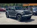 Used 2018 Granite Crystal Metallic Clearcoat Jeep Sport S video 1