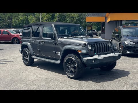 Used 2018 Granite Crystal Metallic Clearcoat Jeep Sport S image 1