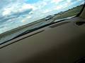 driving around the track in a cayman