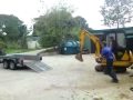 greenkeeper flipping onto a trailor