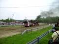 Steam tractor hooked to a pulling sled