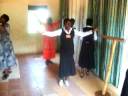 Ugandan women worshipping Ugandan women worshipping