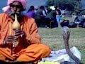 A snake charmer in Pokara A snake charmer in Pokara