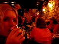 a resturant in paris 'the latin quarter' stood a man looking a bit like dennis farina playing an accordian...