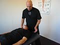 Skolerne for Idrætsmassage -- stretching of trapezius muscle,