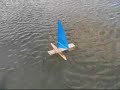 Look at the direction of the water ripples caused from the wind and when the sail stalls to get an idea on how high the proa is pointing. Also watch foil in the steadier puffs .Boat heels foil sink to a depth rises as it reaches speed stabilizes .Once stable the gust just excellerate the boat foward with out heeling.