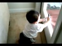 Andrew crawling under the chair - 9 months