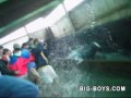 Drunk soccer fan diving in a urinal