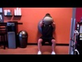 Wall Squat w/ Swiss ball - 
Perform a squat against the wall while using a swiss ball and holding a medball. Perform 15 reps for 3 sets.