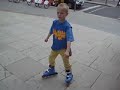 Kids skating in front of Arc de Triomf in Barcelona Kids skating in front of Arc de Triomf in Barcelona