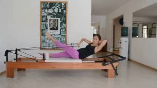 Roll Down Oblíquo com Remada e Elevação de Perna