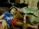 noah playing with sunny and pushing capris bear for her