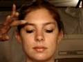 Applying Mascara to Another Person
