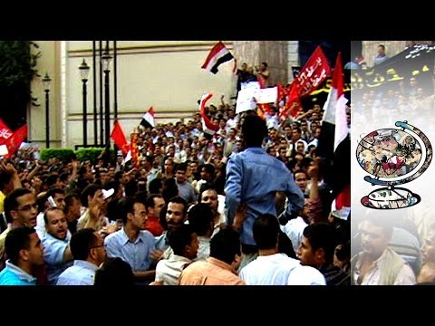 muslim brotherhood motto - Islamist Mursi begins forming Egypt's new government For downloads and more information visit: http://www.journeyman.tv/19140/short-films/the-muslim-brotherh...