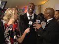 ro parrish talks to terrell owens about his atire for the night at his birthday party