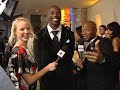 ro parrish talks to terrell owens about his atire for the night at his birthday party