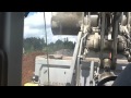 Loading trucks and feeding the screener.