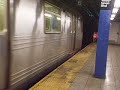 Manhattan-Bound R46 R train leaves Woodhaven Blvd
