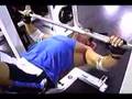 Troy performs great form on the Smith Machine Benc
