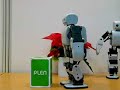 Plen robot lifting a box