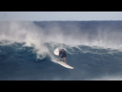 job - Jamie O'Brien tries a new technique by paddling out on his longboard and then dropping in his short board to ride the wave. Later, despite despite the warnin...