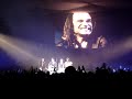 yannick noah en concert a forest national (bxl) le 16 decembre 2007. petite pause cadeau et il prend le temps de savourer une biere a notre sant� puis de pousser une belle chansonnette!