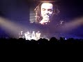 yannick noah en concert a forest national (bxl) le 16 decembre 2007. petite pause cadeau et il prend le temps de savourer une biere a notre sant� puis de pousser une belle chansonnette!