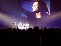 yannick noah en concert a forest national (bxl) le 16 decembre 2007. petite pause cadeau et il prend le temps de savourer une biere a notre sant� puis de pousser une belle chansonnette!