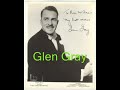 their name often linked with leader glen gray, the casa loma orchestra was the first ''swing'' band. as early as 1929 they began playing the same mixture of hot jazz and sweet ballads that benny goodman would later popularize and that would dominate the music industry in the late 1930s and early 1940s.
originally named the orange blossoms, the group first formed in detroit during the mid-1920s as an offshoot of jean goldkette's orchestra. gray, then known as spike knoblaugh, joined the group in the winter of 1925-26 as a sax player. henry biagini was leader. playing in and around the detroit area the orange blossoms were booked into a brand new toronto club called the casa loma in 1927. built in preparation for a visit by the prince of wales the club never opened, and in 1929 the orange blossoms, shedding goldkette's mantel and striking out on their own, decided to rename themselves the casa loma orchestra in memorial.
the bandmembers formed a cooperative, dismissing biagini and electing gray as president and leader. they moved to new york and were soon booked into the roseland ballroom, where a representative from okeh records discovered them and offered a deal. alternating between big band jazz and sentimental ballads the group sounded better on the latter than it did on the former. nevertheless, the casa loma orchestra had a unique sound and quickly began to attract the attention of the hipper college crowd.
after cutting six sides for okeh the group signed with brunswick. they were so popular however that victor also signed them, and the group ended up recording on both labels simultaneously. eventually they began to record exclusively for brunswick and remained there until signing with decca in 1943. kenny sargent, who also played sax, was vocalist. on their first sides for okeh and brunswick, they were billed as simply the ''casa loma orchestra.'' victor however billed them as the ''glen gray orchestra.'' after leaving victor they began using the combined moniker ''glen gray and the casa loma orchestra.''

recording: glen gray & his casa loma orch. voc. kenny sargent  - under a blanket of blue (jerry levinson/marty symes, al neiburg), brunswick  1933