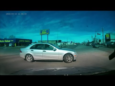 Unsafe left turn in a benz... totally could have t-boned her...