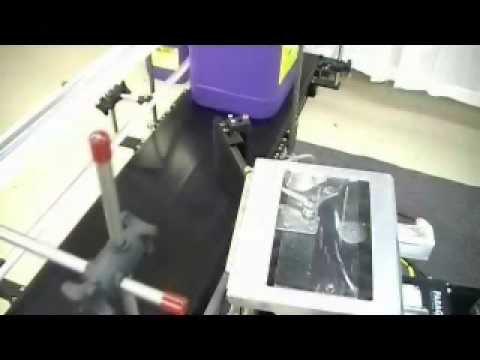 Tamp Roll Onto Square Containers (Print Apply)