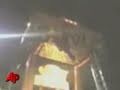 Caught on Tape: Woman Dangles From Carnival Ride