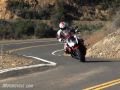 Motorcycle Reviews: 2010 Streetfighter Shootout: Kawasaki Z1000 vs. Triumph Speed Triple