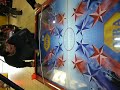 this a pure demonstration of the freaky evil powers of this broken god-forgotten air hockey table. look as the reflections are going mad as our brave tester is risking his mind by playing with the puck. brr... he has not been the same anymore since this time (he now always bounce in the wrong way when he bumps a wall). it is obvious that we discovered the famous ufo power of old game shuffle puck caf�.