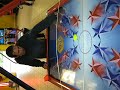 this a pure demonstration of the freaky evil powers of this broken god-forgotten air hockey table. look as the reflections are going mad as our brave tester is risking his mind by playing with the puck. brr... he has not been the same anymore since this time (he now always bounce in the wrong way when he bumps a wall). it is obvious that we discovered the famous ufo power of old game shuffle puck caf�.