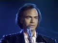 PLEASE NOTE: I divided my uploads between multiple channels, Bookmark this link in your browser for instant access to an index with links to all of John1948's oldies classics. LINK: tinyurl.com Neil Leslie Diamond (born on January 24, 1941) is an American singer-songwriter. As a successful pop music performer, Diamond scored a number of hits worldwide in the 1960s, 1970s, and 1980s. According to David Wild, common themes in Diamond's songs are 