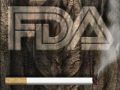 Obama, citing his smoking woes, signs tobacco law