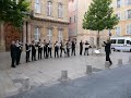 the brass section of the vu-orchestra from amsterdam playing the fanfare from la peri (paul dukas) in front of the cathedral of aix-en-provence, france, july 2007.
